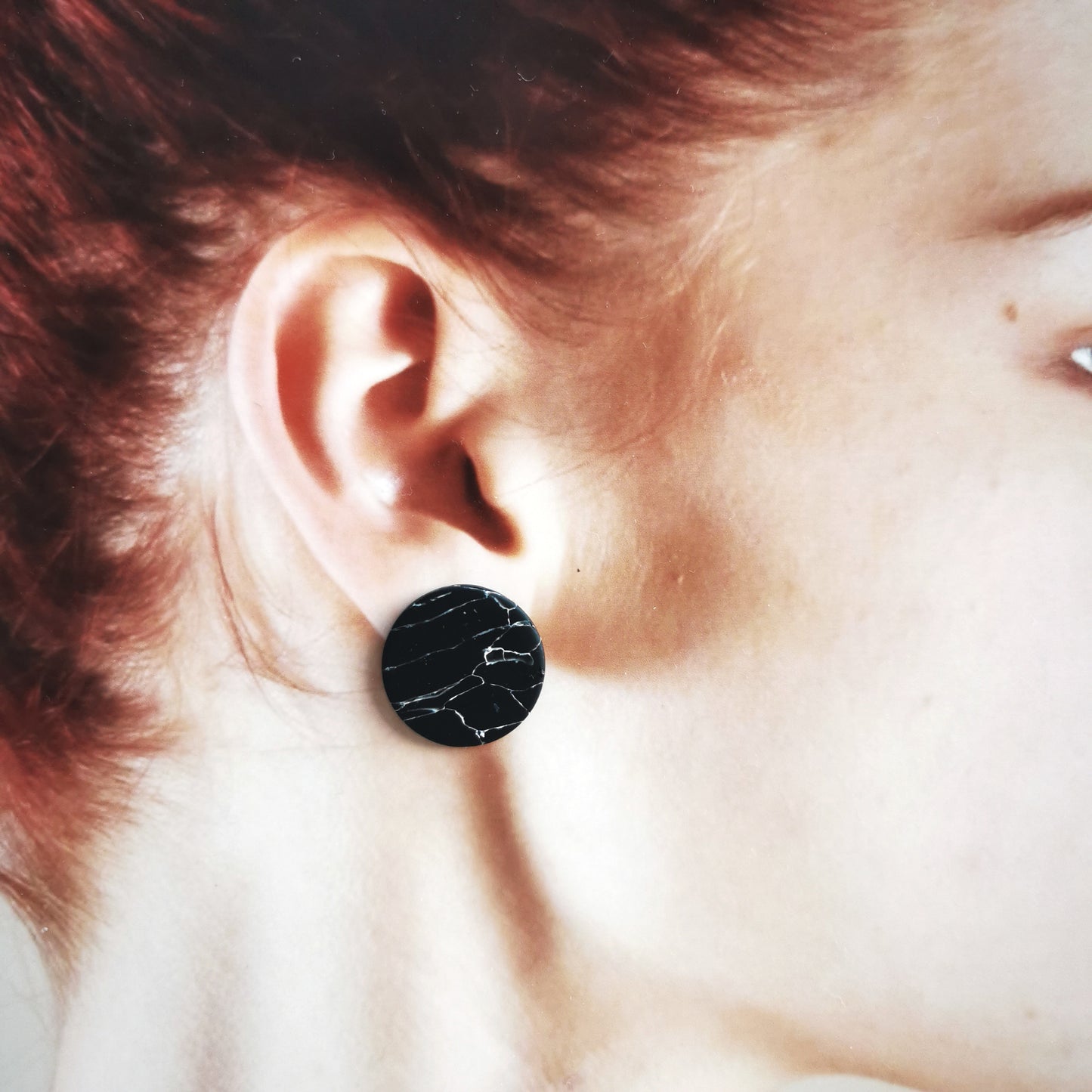 Minimal black marble stud.