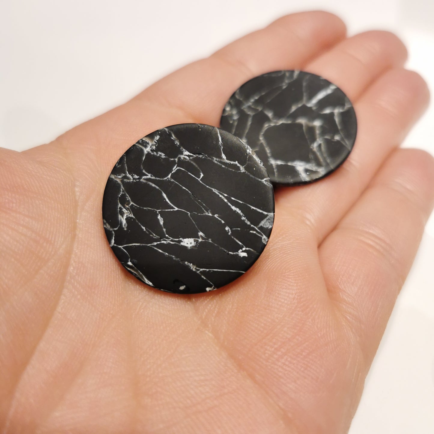 Minimal black marble stud.