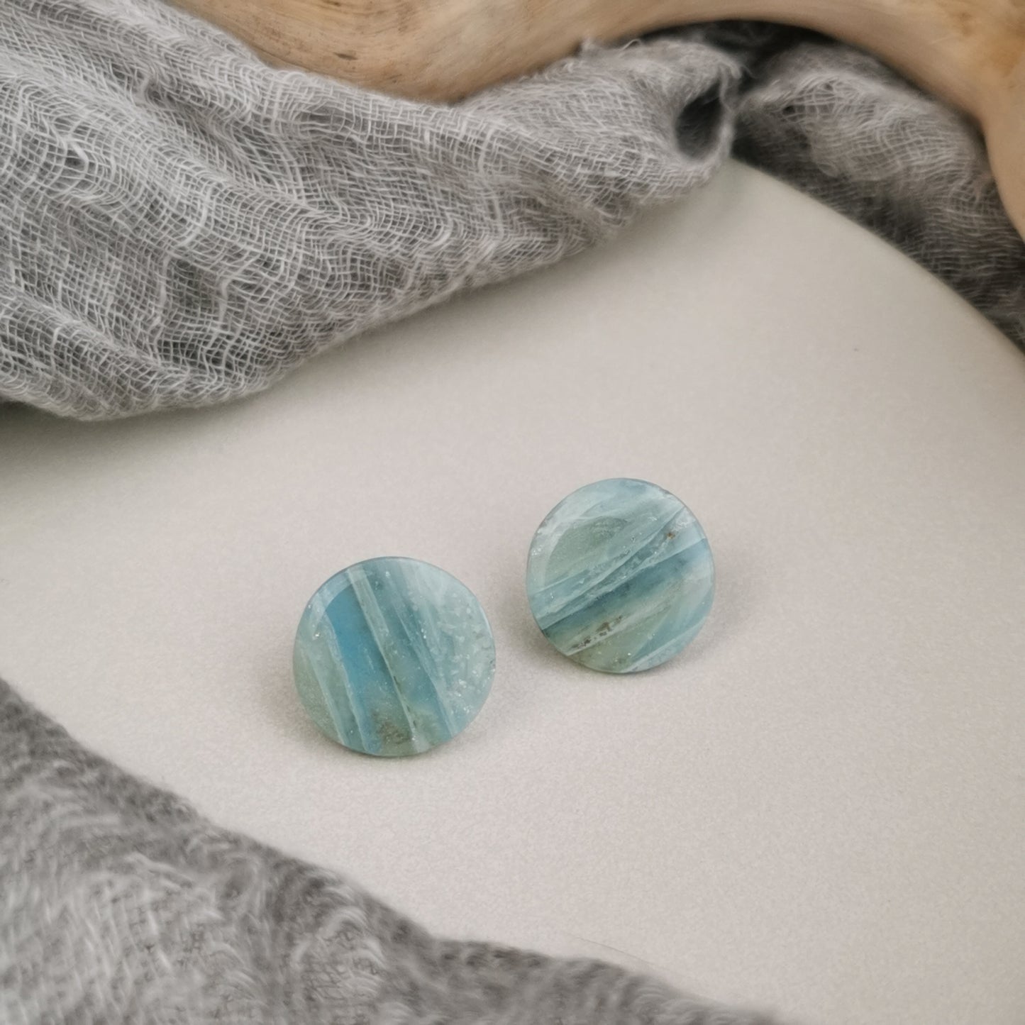 Aquamarine faux quartz stud.